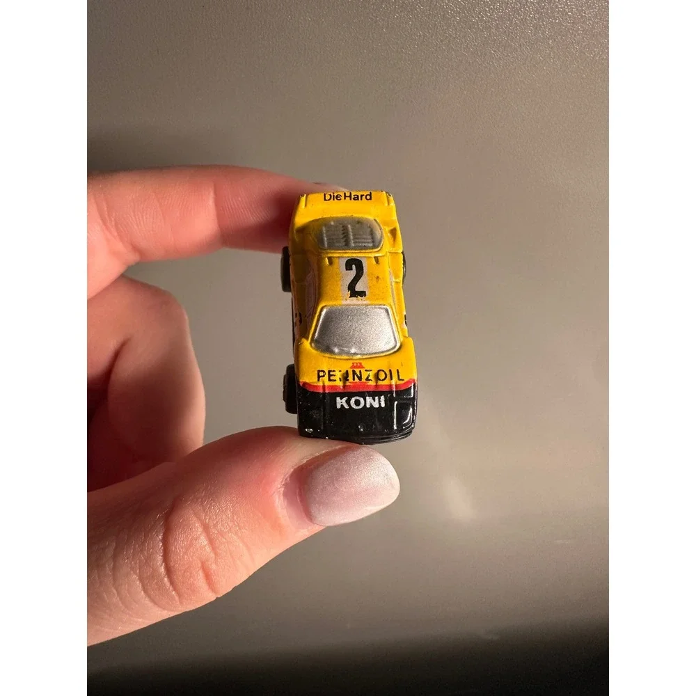 Small Micro Machine Race Car F-40 Yellow & Black # 2 (Snap Back) A Pull Back Toy